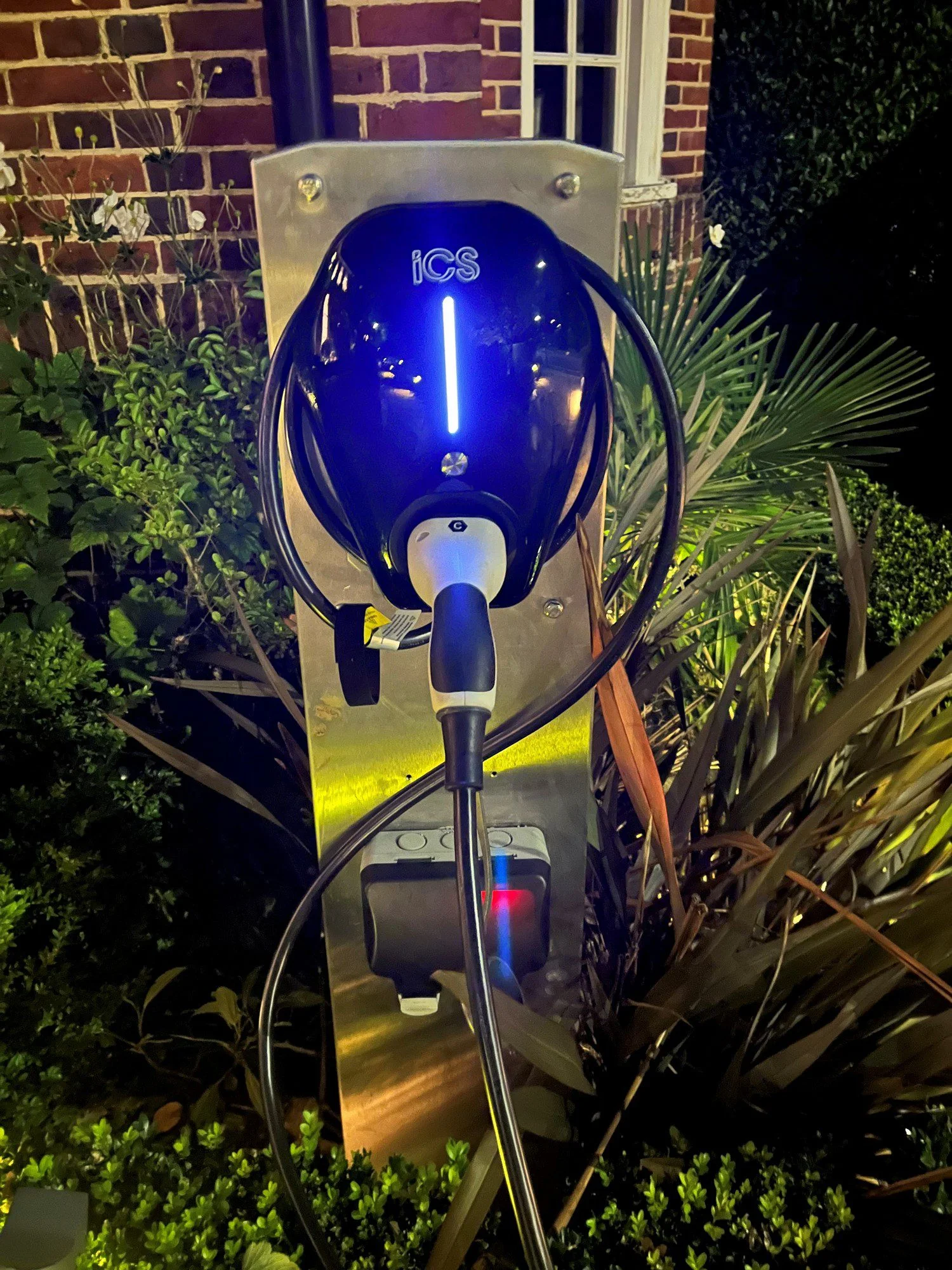 Expert electricians in London installing EV charger