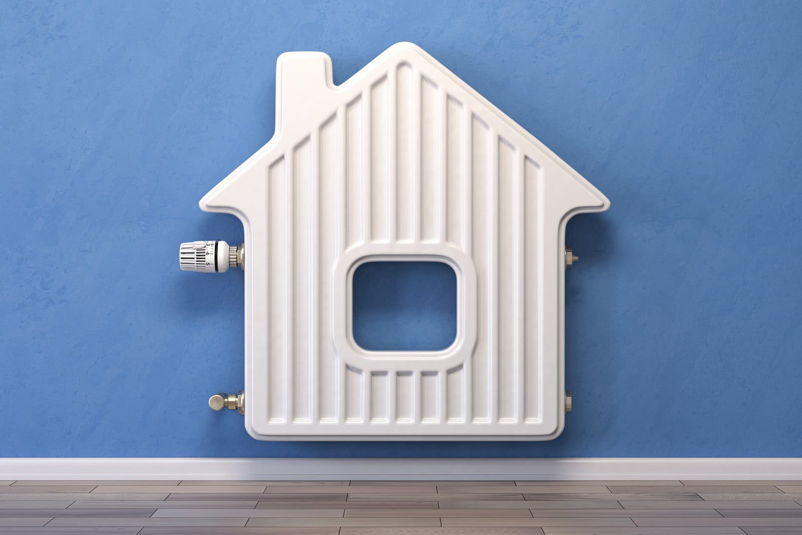 The image features a radiator in the shape of a house mounted on a wall. It's a central heating radiator commonly used to heat interior spaces. The radiator has valves on both sides, likely for controlling the flow of hot water or steam through the system. The wall is painted blue, and there is a wooden floor below. The house-shaped design of the radiator adds a decorative and playful element to a typically utilitarian object.